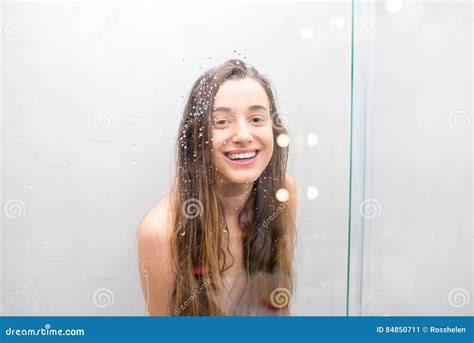 teen lesbian shower|cute young girl lovers bathe together under a shower in a dark。